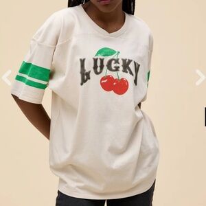 🧡 Daydreamer Cream and Green Graphic Tee